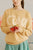 Tommy sweater in Sand farben mit dem CIAO Print für Frauen